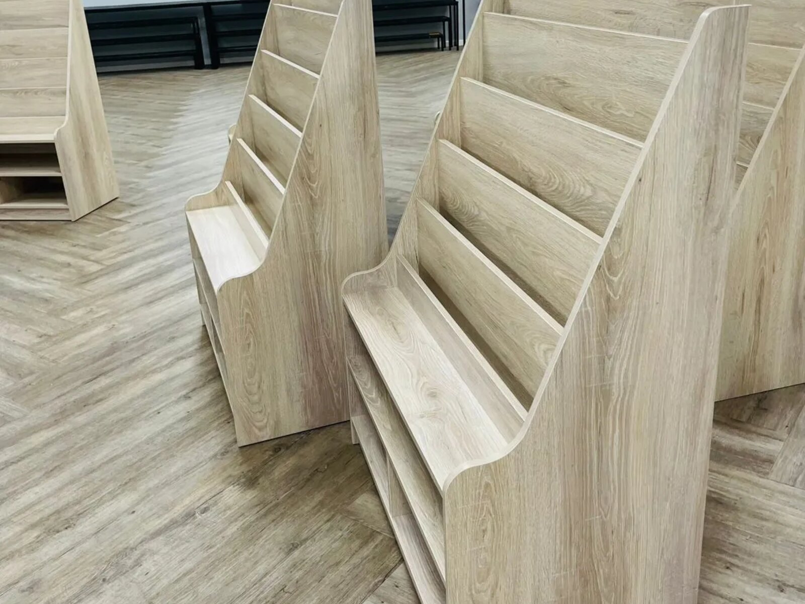 Adjustable library shelving in a school